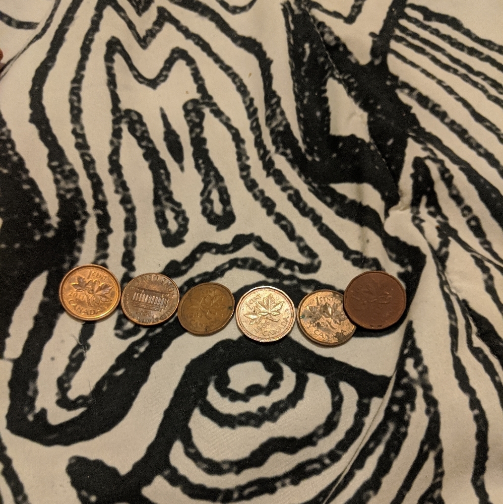 Six very well conditioned pennies